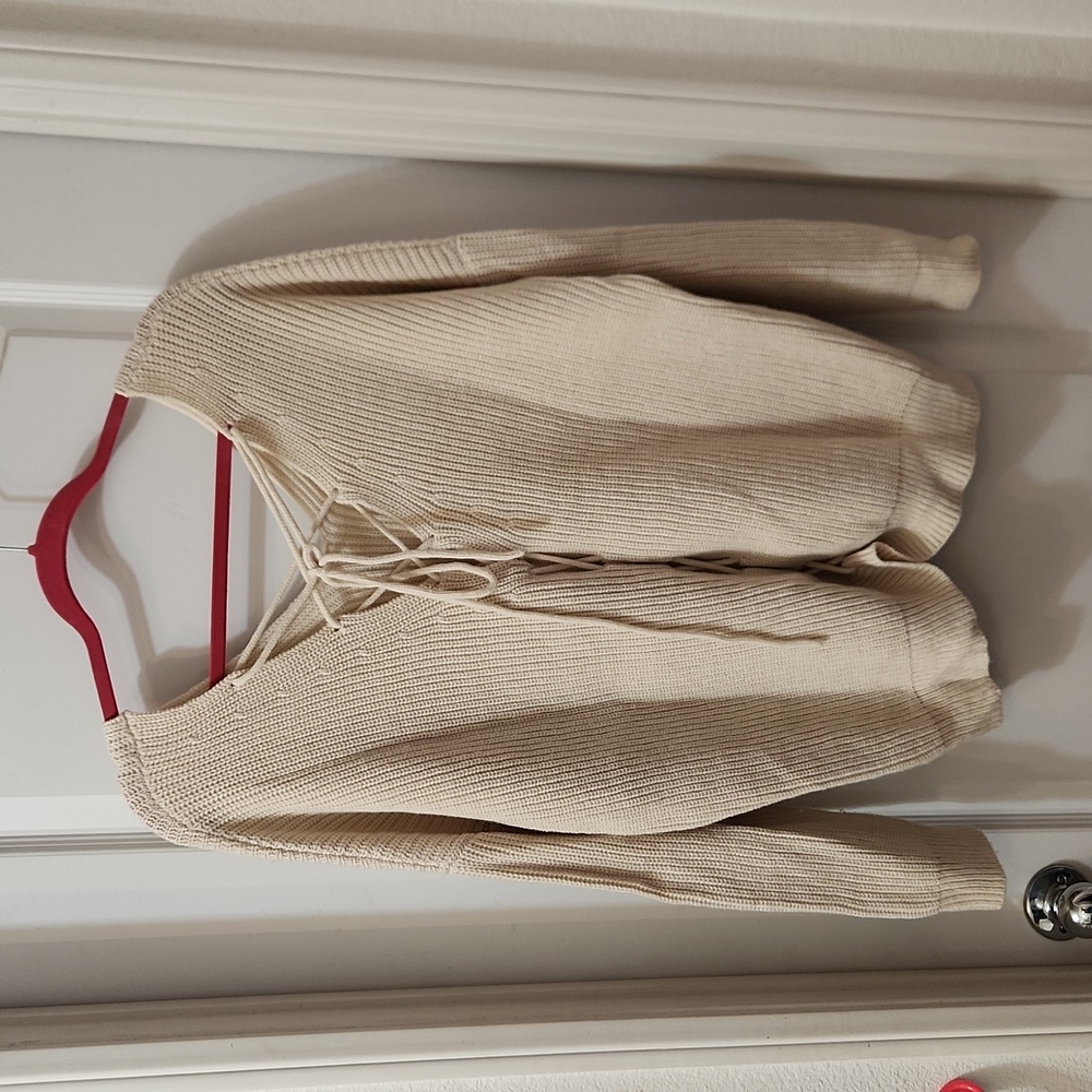 Cream lace up sweater